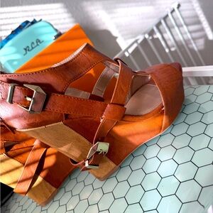 Burnt orange wedge sandal with gold accents